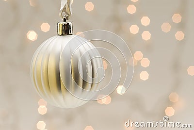 White Christmas ball with blurred lights Stock Photo