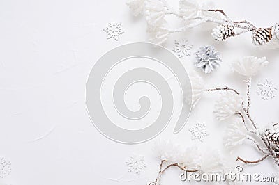 White Christmas border with cones, snowflakes and snown flowers. Xmas Wreath decoration with place for your text Stock Photo