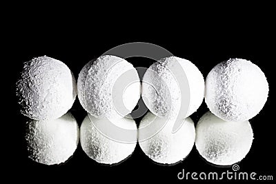 White christmas decorative ball over mirror reflected reverberation on dark black background. To write 2019 on Stock Photo