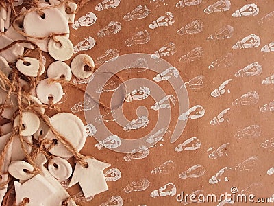 White Christmas tree decorations with wrapping rope on craft background Stock Photo