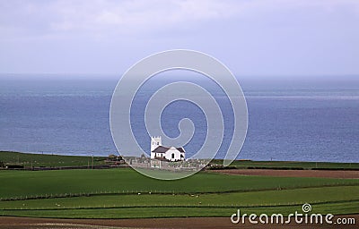 Ballintoy Church of Ireland, serene landscape on the coast Stock Photo