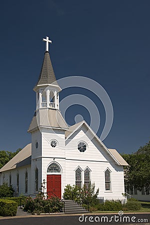 White Church with Red Doors Stock Photo