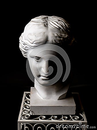 White clay head on black background Stock Photo