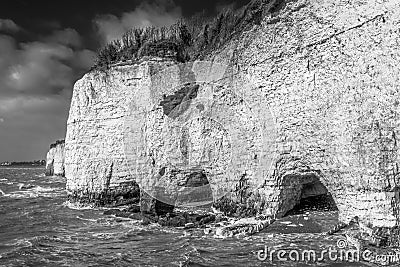 White cliffs and arches at high tide at Pegwell Bay, Kent, Thanet, seen from Ramsgate Royal Harbour Approach road Stock Photo