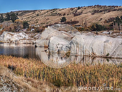 White cliffs reflections at the Blue Lake at St Bathans in New Zealand Stock Photo