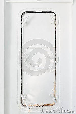 White closed iron door on the ship Stock Photo