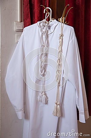 Clothes of christian priest on a hanger Stock Photo