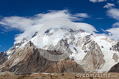 White cloud circularly dance around Broad Peak,Karakorum range o Stock Photo