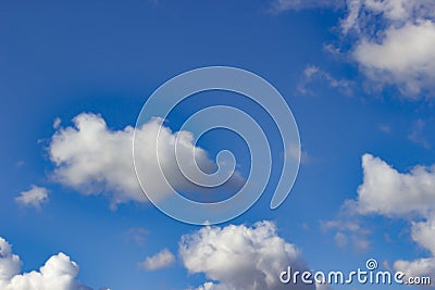 White clouds against blue sky background Stock Photo