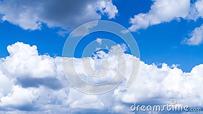 White clouds on a blue sky. Blue sky with heacy clouds. Stock Photo