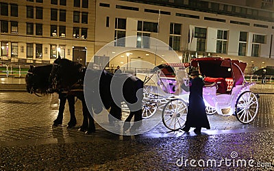 White coach in Pariser Platz, Berlin, Germany Editorial Stock Photo