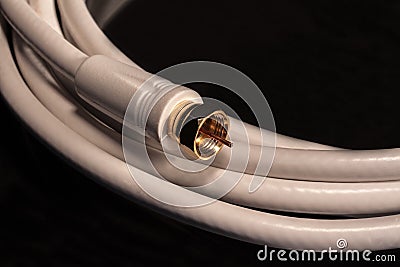 White Coax cable for satelite cable video audio connections Stock Photo