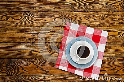 White Coffee cup top view on old wooden table. Aromatic coffee drink in white cup on brown wooden table Stock Photo