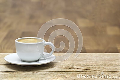 White coffee cup on oak wooden table. Copy space Stock Photo