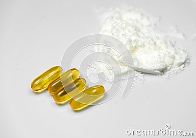 White Collagen powder from sea fish extract and fish oil pills Stock Photo