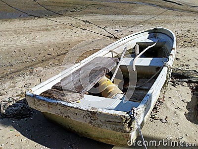 white color broken traditional sampan in Luk keng Tsuen Sunny Bay hongkong Island Stock Photo