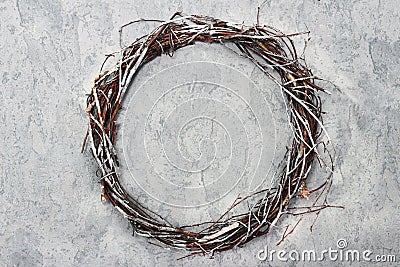 Wreath of branches on a gray background Stock Photo