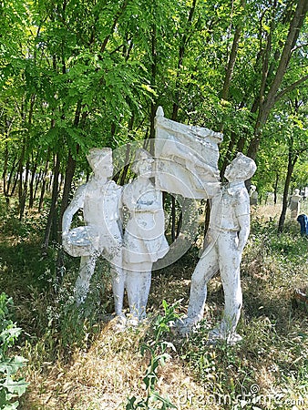 White concrete sculpture of three Soviet pioneers in Ukraine. Editorial Stock Photo