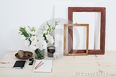 White contemporary feminine work desk with flowers Stock Photo