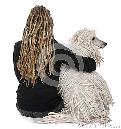 White Corded standard Poodle and a girl Stock Photo