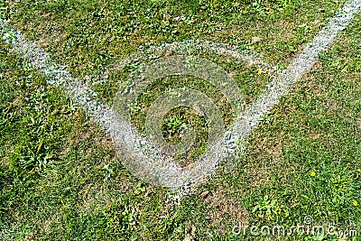 White corner lines on empty soccer grass field Stock Photo