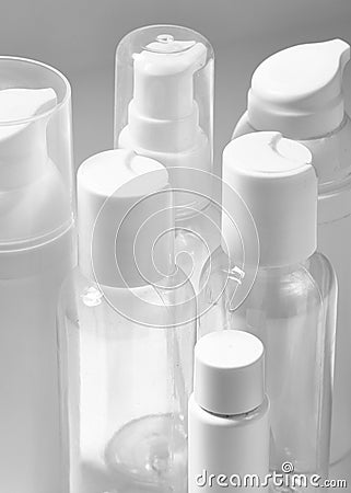 White cosmetic bottles on white background. Wellness, spa and body care bottles collection. Beauty treatment Stock Photo