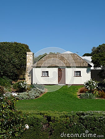 White cottage and garden Stock Photo