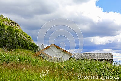 White cottage on a mountain in a meadow, Hemsedal, Norway Stock Photo