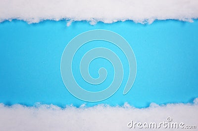 White cotton texture snow blanket, is soft, fluffy wadding, cotton at blue background with copy space for your own text Stock Photo