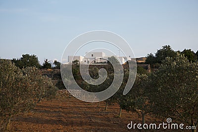 White country house on the island of Ibiza surrounded by nature in the northern part of the island. Stock Photo