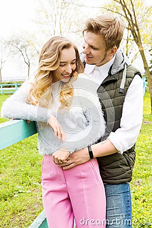 White couple hugging close-up portrait outdoor vertical image Stock Photo