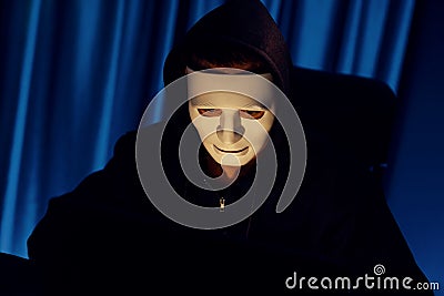 White criminal anonymous mask installing coding password encryption. Pecuniary. Stock Photo