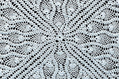 White crochet fabric on black background Stock Photo