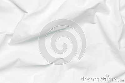 White crumpled natural cotton fabric top view. Natural linen background. Eco textiles. White Fabric texture. Fabric Stock Photo