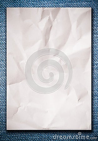 White crumpled paper on blue jeans Stock Photo