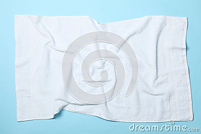 White crumpled towels on blue background Stock Photo