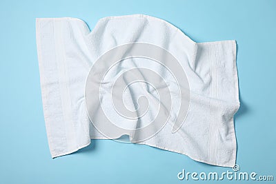 White crumpled towels on blue background Stock Photo