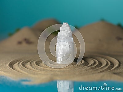 White crystal in miniature sea shore landscape Stock Photo