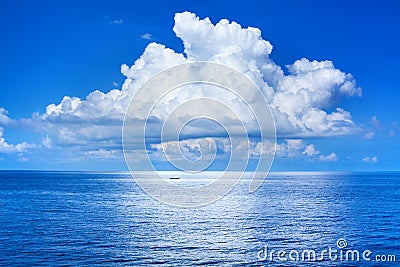 White cumulus clouds in blue sky over sea landscape, big cloud above ocean water panorama, seascape panoramic view, cloudy weather Stock Photo