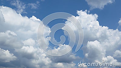 Beautiful white cumulus clouds in the blue sky. Weather forecast concept. Oxygen, environment. Stock Photo