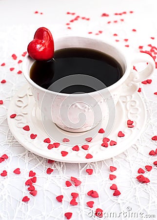 White cup of coffee decorated with red heart Stock Photo