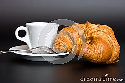 White cup coffee, spoon and croissant Stock Photo