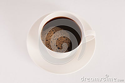 White cup filled with hot black coffee Stock Photo