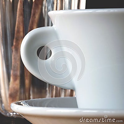 White cup and glass in quadrate frame Stock Photo