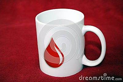 White cup having blood drop mark inspiring to donate blood Stock Photo