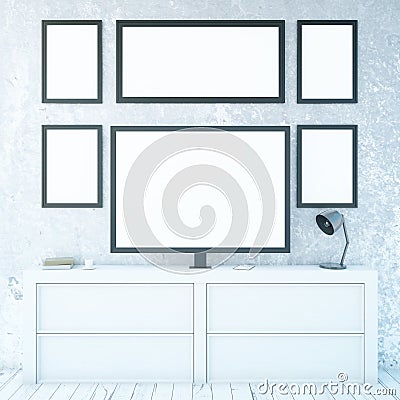 White cupboard with monitor and frames Stock Photo