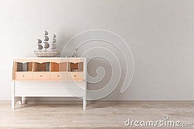 White cupboard with ship in light room Stock Photo