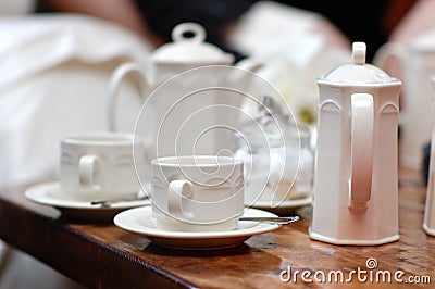 White cups and teapot set Stock Photo