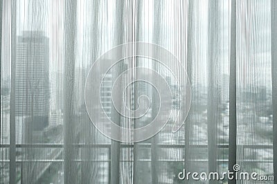 White curtain sunlight through the windows in the city. Stock Photo