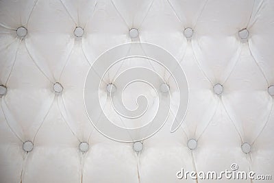 White cushioned background with buttons Stock Photo